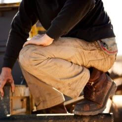 Men's Ariat FR 10017227 M4 Khaki Workhorse Low Rise Boot Cut Pant -Western Cowboy Clothing 10017227 lifestyle